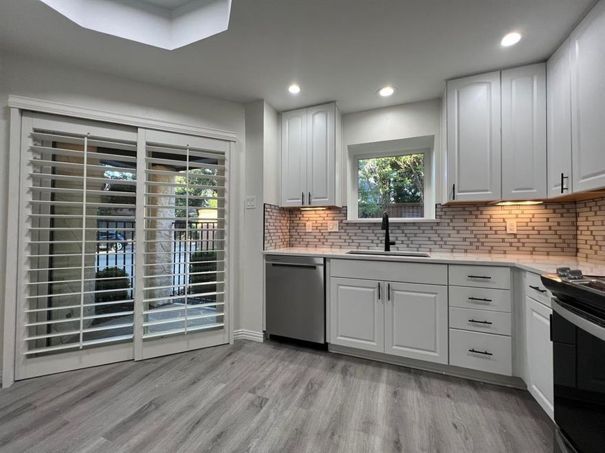 A complete makeover with professional designer in 2023! This is a very unique property convenient to DFW airport, Addison restaurants, shopping, and The Galleria to mention a few. Fresh paint from head to toe, high end laminate flooring and designer tile. The kitchen boasts all new shaker style cabinets, appliance package, and quartz counters. Both primary and secondary bathrooms have new cabinets, showers with glass doors, quartz counters, new fixture and custom lighting. All bedrooms have separate remotes to control lighting and fan functions. Grand sized living room with a soaring black tile fireplace that really makes a statement. All rooms have very nice wood shutters. The landscaping is all turf and flower beds built for low maintenance. Landlord covers lawn, and internet included in the price. Large two car garage with extra storage and cedar closet. We do all paperwork. Requirements are 3 times the monthly rent for income, no judgements or evictions. No pets. Request app link.