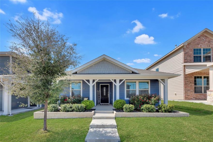 Ideally situated in the highly desirable Palmilla Springs community of West Fort Worth, this better-than-new residence makes a stunning first impression with its picture-perfect curb appeal, highlighted by vibrant flower beds and an inviting front porch. Step inside to an expansive open-concept layout that seamlessly connects the living, kitchen, and dining areas—perfect for both everyday living and effortless entertaining. The chef in your family will love preparing meals in the stylish and functional kitchen, featuring crisp white cabinetry, a gas range, and a spacious center island. The light-filled living and dining areas offer a warm and welcoming atmosphere, with ample space for relaxing or hosting guests. Tucked away at the back of the home, the luxurious primary suite serves as a peaceful sanctuary to unwind at the end of the day. The low-maintenance backyard offers the perfect blend of relaxation and ease—featuring a covered patio for quiet moments and just enough lush green space for kids and pets to enjoy, all without the burden of extensive upkeep. Don’t miss the garage, featuring sleek epoxy flooring that delivers a clean, finished look—perfect not only for parking vehicles, but also ideal for storage, hobbies, or even a home gym. Neighborhood amenities include a playground, dog park, and miles of scenic walking trails. Ideally located in a rapidly appreciating area near the I-30 and I-820 corridors, with endless shopping, dining, and entertainment options just moments away.