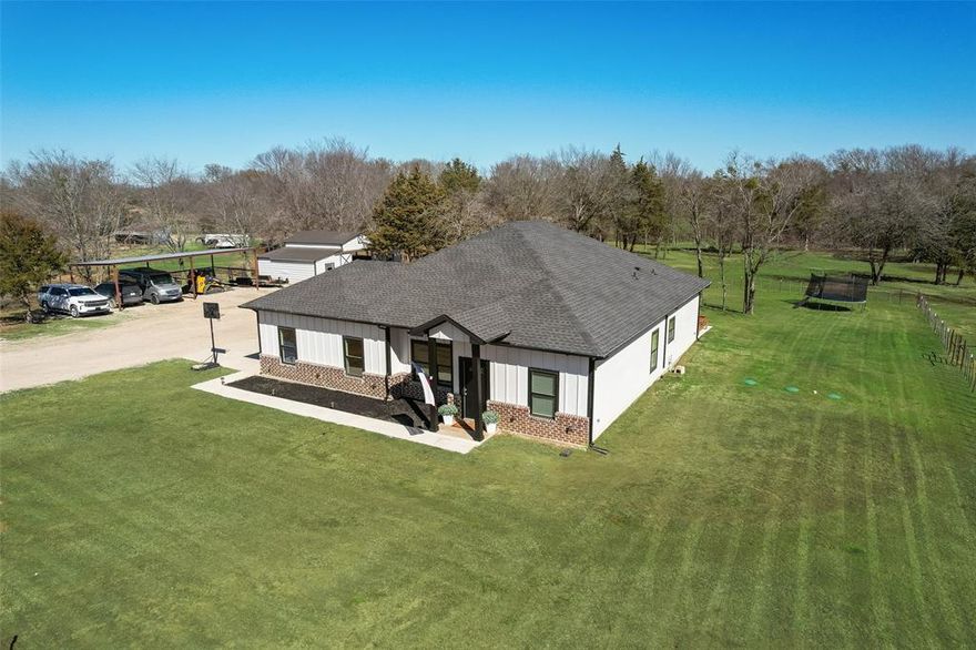 Turnkey Horse Property on 5 Acres – Just 40 Miles from Downtown Dallas! 

Stunning, move-in-ready horse property situated on 5 acres of sandy loam soil in a peaceful country setting - yet just minutes from the conveniences of rapidly growing Terrell, Texas. Perfectly set up for equestrian use, this property is truly horse-ready from day one.

The land features a 4-stall barn with tack storage area, is cross-fenced into multiple paddocks, and enclosed with durable wire-and-stay fencing. A large, flat front pasture offers an ideal space for riding, training, or future arena development.

The newer, one-owner home offers 4 bedrooms and 2 bathrooms with an open, modern feel. Interior highlights include stained concrete floors, granite countertops, stainless steel appliances, and an attached 2-car garage. Outdoor living shines with an oversized concrete patio, a built-in sandbox, and plenty of room to relax or entertain. The property also provides ample additional parking, including a crushed rock base area and four covered carport spaces - ideal for trailers, equipment, or guests.

Enjoy the best of both worlds: a quiet, country neighborhood with quick access to shopping, grocery stores, restaurants, and entertainment. Spectrum high-speed internet is available, making this property perfect for remote work as well.

Don’t miss this rare opportunity to own a charming, turnkey equestrian property with room to grow - conveniently located and ready to enjoy.