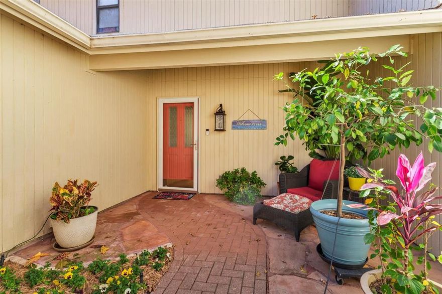 Experience refined, resort-style living in this low-maintenance townhouse located in the prestigious DeCordova Bend Estates, offering the rare combination of golf course and Lake Granbury views overlooking the #2 tee box. These townhouses rarely come up for sale and this is your opportunity. This updated home features wood floors, gas fireplace, and large windows in the living room.  Nice and large bedrooms. Updated resort-style custom bathrooms, granite countertops in the kitchen, and newer appliances. The comforts of a tankless water heater and a water filtration system in the kitchen. Luxury induction electric range. Enjoy the light-filled sunroom with large windows, a spacious outdoor patio perfect for taking in the scenery, and a propane fireplace in the living room. Comforts of a tankless H2O heater,  Relax under the outdoor gazebo while enjoying the sound of the running water and watch the golfers. Fishing is also great off the back yard.  Additional highlights include a golf cart garage and an easy-care yard, sprinkler system, which are ideal for relaxed living. Conveniently located close to the clubhouse, 19th hole, fitness facility, community pool, tennis courts, volleyball courts, and lake access for a true luxury resort-style lifestyle.