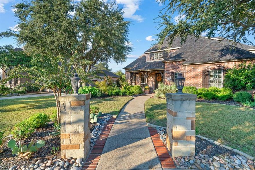 Some properties are just a JOY to view, and lucky for you- this is one of them! This home has been meticulously cared for, thoughtfully updated, and lovingly improved with a designer eye. Not only that, but it also has many highlights that set it apart you'll quickly understand why this home is a KnockOut! It has many qualities you might expect in a luxurious home- high ceilings, surround sound throughout, functional layout and fantastic space, high-end finishes, gleaming hardwood flooring, custom landscaping and lighting, and attention to detail at every corner-  but pair this with hard-to-find options such as a 4 car garage, sauna in the primary ensuite, fully equipped outdoor kitchen, private backyard adjacent to lush trees and greenspace, inground pool and spa with slide, water features and updated WiFi pool equipment, expansive grass area, and almost half an acre lot in an incredible golf community with immense amenities, you'll not only fall in love, but want to move in immediately.

The primary suite and a secondary bedroom ensuite are located on the main level along with a spacious eat-in kitchen, warm and inviting living room, functional office, dining room, powder bath, and utility room. Upstairs you'll find an additional 2 bedrooms, game room, media room, a bonus room and even an unfinished space which could be additional square footage or even a 5th bedroom- lots of possibilities!

So now you understand the awesomeness of this property, can you believe it's also located within a coveted neighborhood in an award-winning, master-planned community with highly rated schools? You get the house AND the community!! We're talking a new pickleball court facility, tennis and basketball courts, pools, splash pads, fitness centers, trails, playgrounds, events all year, public and private school options, the whole bit! Also located just 25 mins from DFW Airport and equidistant to Dallas and Ft Worth. The only question remaining is when are you moving in?