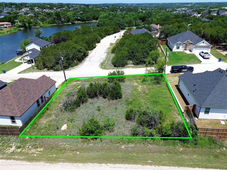 GUARDED & GATED LAKE FRONT COMMUNITY*BUILD YOU DREAM HOME*BRING YOUR OWN BUILDER*NO CITY TAXES*OUTSIDE CITY LIMITS*WATER IS AQUA CO OP*ELECTRIC IS UNITED CO OP*COMMON FEATURES INCLUDE SWIMMING POOL, CLUBHOUSE, TENNIS COURTS, CLUB HOUSE AND BOAT RAMP*CITY SEWER*NO SURVEY*BUYER TO PAY FOR NEW SURVEY IF NEEDED*