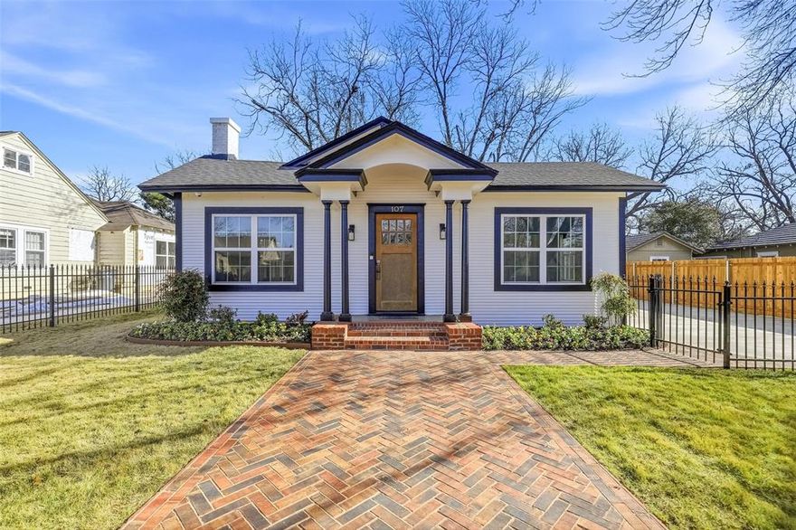 Beautifully restored 100-year-old Sears & Roebuck–style bungalow featuring rare designer finishes throughout. This 3-bedroom, 2-bath home blends historic character with extensive modern upgrades. Refinished original hardwood floors, refurbished (non-functional) fireplace, and all new windows with custom shades.

Designer kitchen includes custom cabinetry, granite countertops, walk-in pantry, built-in microwave, dishwasher, range, and custom wall shelving from deVOL Kitchens (England). Spa-style primary bath offers freestanding tub, separate shower, double vanities, private toilet room, and large walk-in closet. Continuous hot water system provides endless hot showers.

Laundry-mudroom serves as rear entry. Full home HEOS sound system with ceiling speakers. Whole-home security system with CCTV cameras. Under-house ventilation system. Whole-house natural gas Generac generator.

Exterior upgrades include brand-new siding and paint, all new concrete driveways and sidewalks, custom brick herringbone front walk, wrought-iron fenced front yard, fully fenced front and back yards, and in-ground sprinkler system. Carport connects to a standalone shed with heavy-duty shelving.

Set on a former pecan orchard with three producing 100+ year old pecan trees and mature post oak trees providing excellent shade. Exceptionally upgraded historic bungalow with designer details rarely found at this price point!