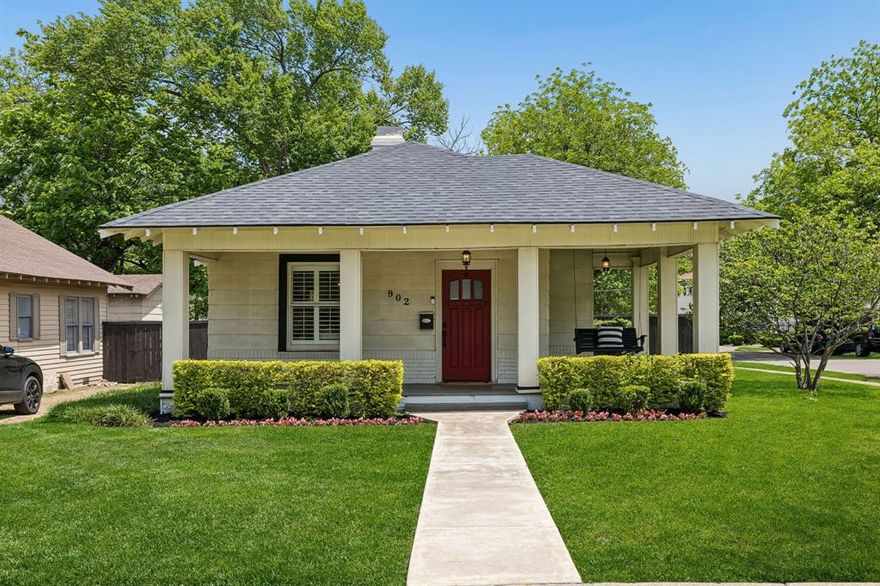 Perched on a charming corner lot in the beloved Kings Highway—right by Kessler Park—this darling Craftsman is full of personality and heart in the sweetest pocket of North Oak Cliff! With 3 bedrooms and 2 baths, you’ll fall in love with the gorgeous pine hardwoods, tall ceilings, and all the cozy character throughout. The wraparound front porch is straight out of a storybook and just begs for morning coffee or evening chats. Inside, two decorative fireplaces add the sweetest touch, while the kitchen shines with granite countertops, stainless appliances, a gas range, and built-in microwave—perfect for everyday living and hosting friends. The primary bath feels like a little retreat with Carrera marble and a seamless glass shower. Out back, enjoy a private, fenced yard with a spacious wood deck—ready for BBQs and all the fun nights ahead. Major updates include HVAC less than one year old, a newer tankless water heater, a newer gorgeous fence, and foundation repairs completed in 2025 with a transferable warranty. All just minutes from Bishop Arts, downtown, Trinity Groves, and Stevens Park… this one is just special.
