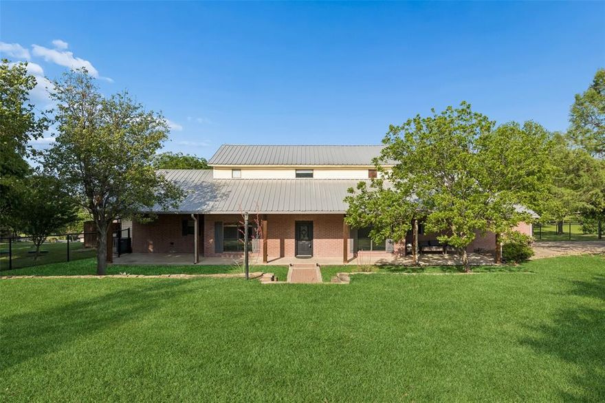 Sellers offering 10K towards rate by down or closing costs! Located in the highly sought-after Aledo Independent School District, this stunning two-story home in Remuda Ranch Estates offers the perfect blend of peaceful country living and modern-day convenience. Nestled on a quiet cul-de-sac and situated on an expansive 1.58-acre lot, this property provides the space, privacy, and freedom you’ve been looking for. A Texas-sized front porch stretches across the front, inviting peaceful mornings in rocking chairs and golden-hour sunsets overlooking charming cactus-inspired landscaping. Boasting 4 bedrooms and 3.5 baths, the home welcomes you with a beautiful entry and rich hardwood floors. The spacious living room features a charming wood-burning fireplace, creating a warm and inviting atmosphere. A large, elegant library or private office with built-in cabinetry and shelving offers the ideal space for working from home or studying in comfort. The oversized kitchen is designed to impress, complete with a large island and abundant cabinetry, perfect for entertaining or bringing out the inner chef in anyone. The first-floor primary suite is a true retreat, highlighted by an elegant bathroom with a large glass-door shower. The true beauty of this home is the land. With 1.58 acres, you have endless possibilities, room to play, entertain, build, or simply enjoy the open space and tranquility. Upstairs, you’ll find two spacious guest suites, each complete with a private en-suite bath and generous walk-in closet plus a third guest bedroom. While you’ll enjoy the peace and quiet of country living, you’re still conveniently close to city amenities.  Move-in ready and located in one of the most desirable school districts in the area, this exceptional property offers space, comfort, and lifestyle all in one. Act quickly, homes like this don’t last long.