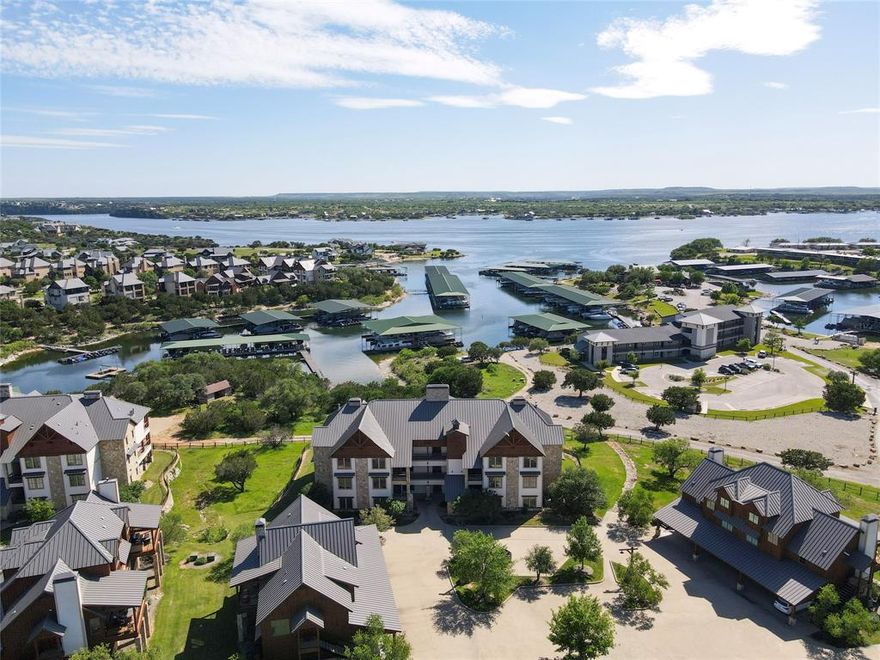 Enjoy effortless lake living in this beautifully furnished ground-floor condo located in the highly sought-after Harbor community at Possum Kingdom Lake. Designed for comfort and convenience, this turnkey property features a well-appointed interior and functional layout ideal for weekend retreats.
Step outside to your private patio - perfect for morning coffee or relaxing after a fun day on the water. This open-concept 3BD, 3BA condo offers beautiful hand-scraped hardwood floors, stainless steel appliances, granite countertops, a gas fireplace for cool lake nights, and a covered patio with outdoor living space and access to a common lawn. This low-maintenance condo offers walkable access to the marina, Hemingway’s waterfront restaurant, resort-style pool, and fitness center, placing the best of PK Lake living right at your doorstep. The Harbor offers a truly vibrant lifestyle - hayrides in autumn, dive-in movie nights, an Easter egg hunt, and a private 4th of July show. A rare opportunity to own a move-in-ready condo in one of PK Lake’s most amenity-rich communities.
