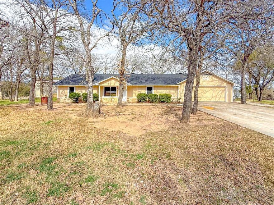 Opportunity is knocking in Whitney, Texas! This spacious 5-bedroom, 3-bath home sits on two lots totaling just under half an acre, offering plenty of room to spread out just minutes from Lake Whitney. Inside you’ll find a flexible floor plan with an isolated primary suite, a large stone fireplace that anchors the living area, and a separate utility room for added convenience. All kitchen appliances convey, making it even easier to get started. This home does need some TLC, but with its size, layout, and location, it presents an excellent opportunity for a family home, weekend lake retreat, or investment property. A major bonus — the home already has a brand-new roof. If you’re in the market to invest or purchase a home to make your own, look no further — this is the one.