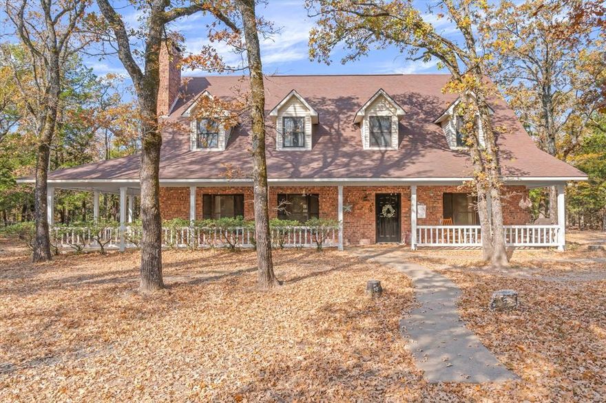 Private Estate & Hunters Retreat on 37+ Wooded Acres with Main Home and Guest Qtrs in Wills Point ISD with gated entry.

Discover exceptional privacy and natural beauty with this gated 37.17 acre property featuring a spacious main home and a charming guest house, set deep off the road!Surrounded by mature trees, wildlife, and peaceful views, this property offers a true retreat for those seeking space, comfort, and versatility.

The 4 bedroom, 3.5 bath main home welcomes you with a large living area anchored by a wood-burning fireplace with brick surround. The light-filled dining room, accented by wood floors, sits just off the gorgeous kitchen, complete with an island, tin ceiling, and decorative lighting that creates a warm, farmhouse-inspired style. A full bath with shower is conveniently located off the living area. 

The downstairs primary suite includes an office or sitting area, plus a beautifully designed master bath featuring a large walk-in shower, double vanities, and tilework. Three additional bedrooms are upstairs; one opens to a private balcony overlooking the stunning grounds. Enjoy multiple outdoor living spaces around the main house, including an inviting enclosed sun porch perfect for year-round relaxation.

The separate guest home offers its own porch with tranquil views of the pond—ideal for extended family, guests, or potential short-term rental income. Inside, it features an updated kitchen,bath,liv & bdr plus front foyer-2nd bdr for comfortable, independent living.The rolling, wooded acreage is rich with wildlife & endless fun! A covered seating area -patio with electricity sits near the pond, creating the perfect spot for outdoor gatherings, morning coffee, or evening unwinding. 
Pole barn with storage room for farm implements,goat pen,3 storage bldgs & shooting range.Driving trails throughout the property plus a 2nd pond.

This one-of-a-kind property combines rural serenity with thoughtful improvements and room to make it your own.