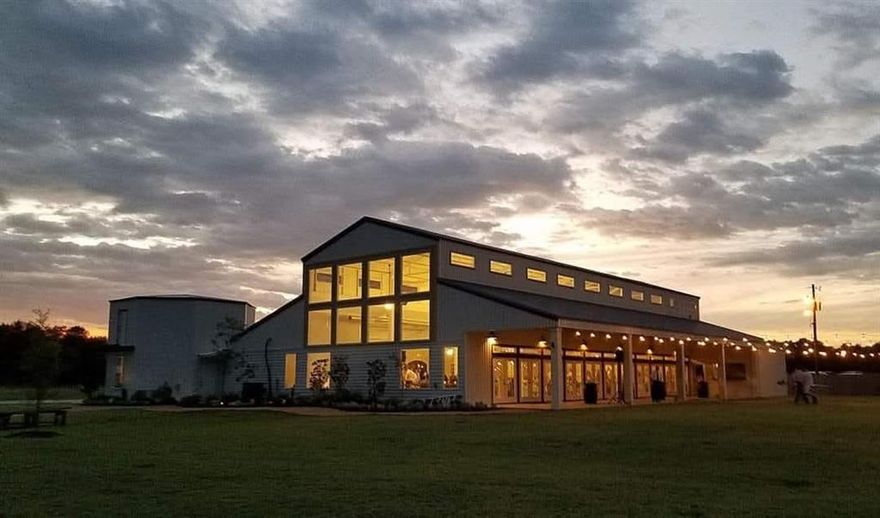 Exceptional Investment Opportunity: Premier Special Event & Wedding Venue on Nearly 15 Acres.

Step into a thriving business with this beautifully established special event and wedding venue, perfectly situated on nearly 15 acres of picturesque land. Boasting over 8,000 square feet of climate-controlled interior space, this venue features a grand main event area with soaring ceilings, a stunning stone fireplace, and walls of windows that flood the space with natural light.

The property includes 4,000 square feet of covered patios, charming rear patio with an outdoor bar, and a fire pit, creating unforgettable experiences for guests. Inside, you'll find a caters kitchen, storage and supply rooms, men's and woman's bathrooms, bridal and groom suites, a finished upstairs office, and two expansive spaces ready for future expansion.

The outdoor areas are equally captivating, featuring a treed ceremony site, private pond, with abundant room to develop additional amenities such as cabins or guest accommodations. With a strong schedule for 2026 and 2027 events already in place and significant opportunities for growth, this venue is perfectly poised for an ambitious new owner. 

Additionally, the property benefits from agricultural exemptions, offering flexibility and potential for further development. Don’t miss your chance to own a thriving, versatile venue that combines charm, functionality, and limitless possibilities.