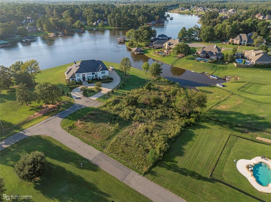 ***Pictures coming soon!!*** Build your dream home on this beautiful 0.77-acre lot in highly sought-after Woodlake Ridge in Benton. With approximately 104 feet of lake frontage, this property sits on a quiet canal that opens up to the wide waters of Black Bayou, offering the perfect balance of privacy and views.
This is one of the last remaining lots available on Black Bayou – a rare opportunity for those wanting to design and build their ideal retreat. The subdivision requires a minimum 2,500 sq ft home. A floorplan for a future home can be included with the sale, making your build process even smoother.
Whether you envision a weekend getaway or a forever home, this lot offers endless possibilities for lakefront living—fishing, boating, or simply relaxing by the water. Agent is owner.