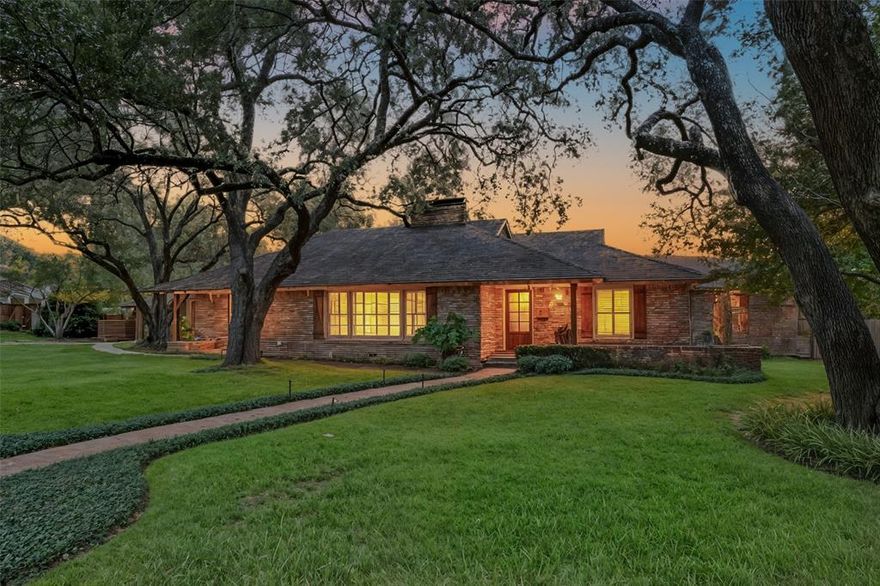 A rare opportunity awaits in the heart of Fort Worth with this beautifully updated residence, perfectly positioned on an expansive private lot that backs directly onto Foster Park and lies within the highly sought-after new Overton Park Elementary zone. Thoughtfully reimagined for modern living, this home is bathed in natural light, offering a fluid and functional layout ideal for both entertaining and everyday comfort.
The family room becomes the heart of the home, anchored by a dramatic wall of windows that frame views of the lush, two-tiered backyard, a remarkable outdoor canvas with endless possibilities. From this vantage point, the evening sky comes alive with Fort Worth’s most spectacular sunsets, transforming the backyard into your own private piece of natural beauty.  An additional living area or combo living dining are located at the front of the house with its own fireplace, and hardwood floors.
Inside, the attention to detail is striking. Every surface has been elevated, beginning with leather finished granite countertops, a farmhouse sink, and a pot filler accenting the professional grade stainless dual-fuel stove. Additional upgrades reflect both luxury and foresight with 100% LED lighting,  WiFi-enabled thermostat,  a tankless water heater and has been incredibly maintained. The primary suite is located separate from the additional bedrooms it  boast designer wallpaper, custom closet and private primary bath.
Even the utilitarian spaces were not overlooked: the garage is outfitted with custom-insulated cedar doors and finished with a commercial-grade epoxy floor, marrying durability with style.
Rarely does a property combine this caliber of thoughtful updates, prime location, and unrivaled outdoor living. A home of both substance and style, it offers an inspired way of life in one of Fort Worth’s most desirable settings.