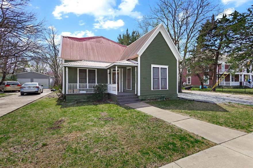 100 Plus Year History Meets Modern Design in this quaint yet elegant remodeled home.  A MUST SEE TO APPRECIATE as this home offers a custom design remodel to a once cottage home that carries an Official Historical Medallion from The Texas Historical Commission being The Martindale-Lackey-Hudgins House built in 1905.  The home, since the 2025 REMODEL now offers 3 bedrooms, 2 full bathrooms, huge custom kitchen with pot filler, gas cooktop, magnificent vent hood and cabinets along with butcher-block style countertops and shiplap style ceiling. Living room with tall custom built-in shelves and a gas fireplace. Dining room center of LR and Kit. Primary BR downstairs also with a wall of customs shelves and romantic gas fireplace and beadboard ceiling. En-suite entertains separate shower, dual sinks, soft close cabinet doors gold tone hardware throughout and an ever so inviting soaking tub to complete a private space fit for a Queen with a bonus large walk-in closet that leads to full size laundry rm complete with pet door. Victorian curved 4in crown molding is quite the accent. Up the Beautiful Oak staircase, the addition to this home will have the wee ones enjoying the custom built in bunks complete with charging stations and reading lights. Jack and Jill bath allows sharing this space to be private yet a perfect design to accommodate both bedrooms for family or guests. Tankless gas water heater in attic which is fully spray foam insulated for maximum utility efficiency. THIS HOMES FINAL PUNCHLIST IS INCOMPLETE AND BEING SOLD AS IS.  MINOR FINISHES TO BE COMPLETED BY BUYER AT BUYERS EXPENSE. Original survey available for boundary info. Buyer to acquire new survey if required or desired.  Interior pics coming on Monday