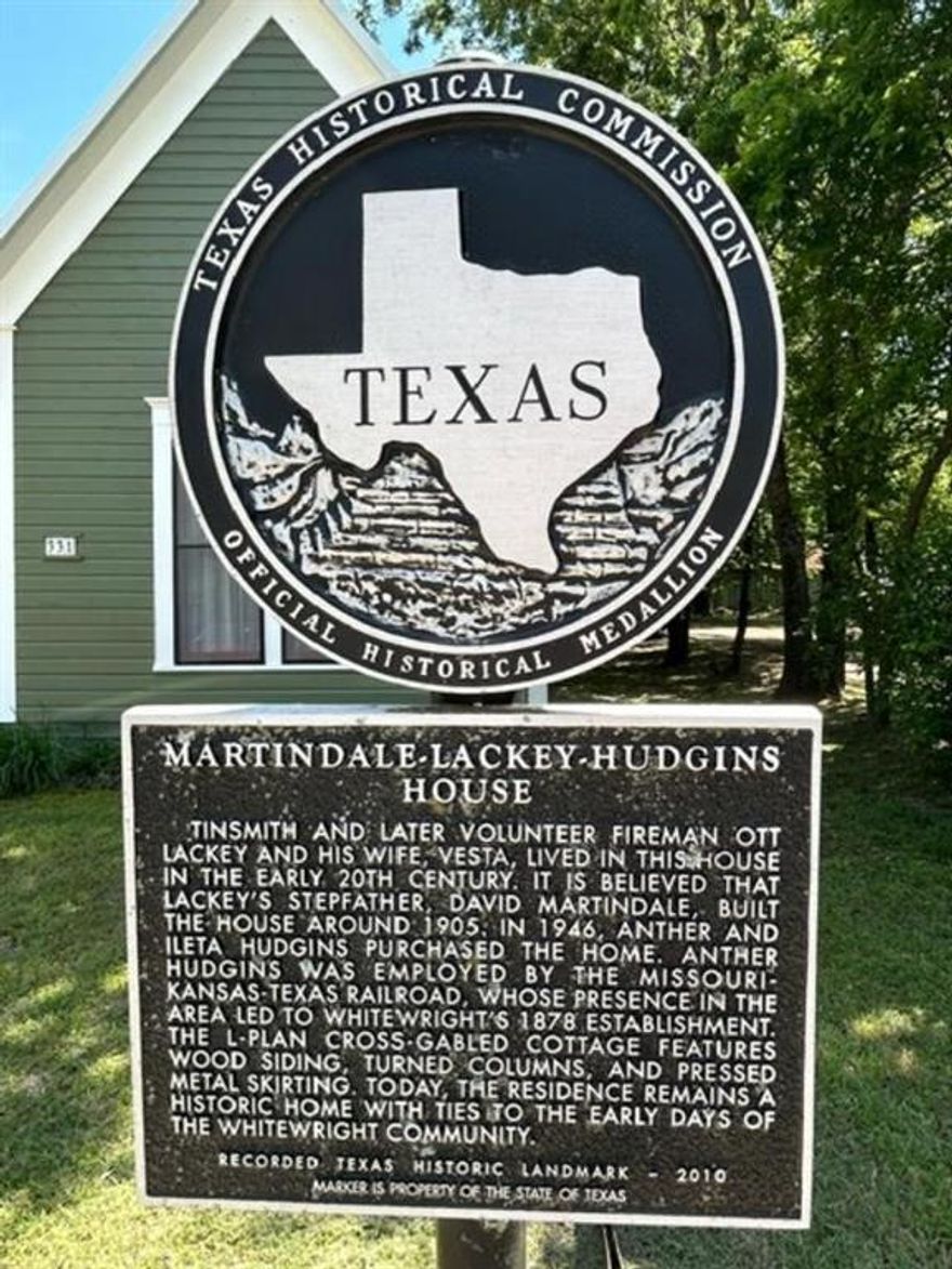 100 Plus Year History Meets Modern Design in this quaint yet elegant remodeled home.  A MUST SEE TO APPRECIATE as this home offers a custom design remodel to a once cottage home that carries an Official Historical Medallion from The Texas Historical Commission being The Martindale-Lackey-Hudgins House built in 1905.  The home, since the 2025 REMODEL now offers 3 bedrooms, 2 full bathrooms, huge custom kitchen with pot filler, gas cooktop, magnificent vent hood and cabinets along with butcher-block style countertops and shiplap style ceiling. Living room with tall custom built-in shelves and a gas fireplace. Dining room center of LR and Kit. Primary BR downstairs also with a wall of customs shelves and romantic gas fireplace and beadboard ceiling. En-suite entertains separate shower, dual sinks, soft close cabinet doors gold tone hardware throughout and an ever so inviting soaking tub to complete a private space fit for a Queen with a bonus large walk-in closet that leads to full size laundry rm complete with pet door. Victorian curved 4in crown molding is quite the accent. Up the Beautiful Oak staircase, the addition to this home will have the wee ones enjoying the custom built in bunks complete with charging stations and reading lights. Jack and Jill bath allows sharing this space to be private yet a perfect design to accommodate both bedrooms for family or guests. Tankless gas water heater in attic which is fully spray foam insulated for maximum utility efficiency. THIS HOMES FINAL PUNCHLIST IS INCOMPLETE AND BEING SOLD AS IS.  MINOR FINISHES TO BE COMPLETED BY BUYER AT BUYERS EXPENSE. Original survey available for boundary info. Buyer to acquire new survey if required or desired.  Interior pics coming on Monday