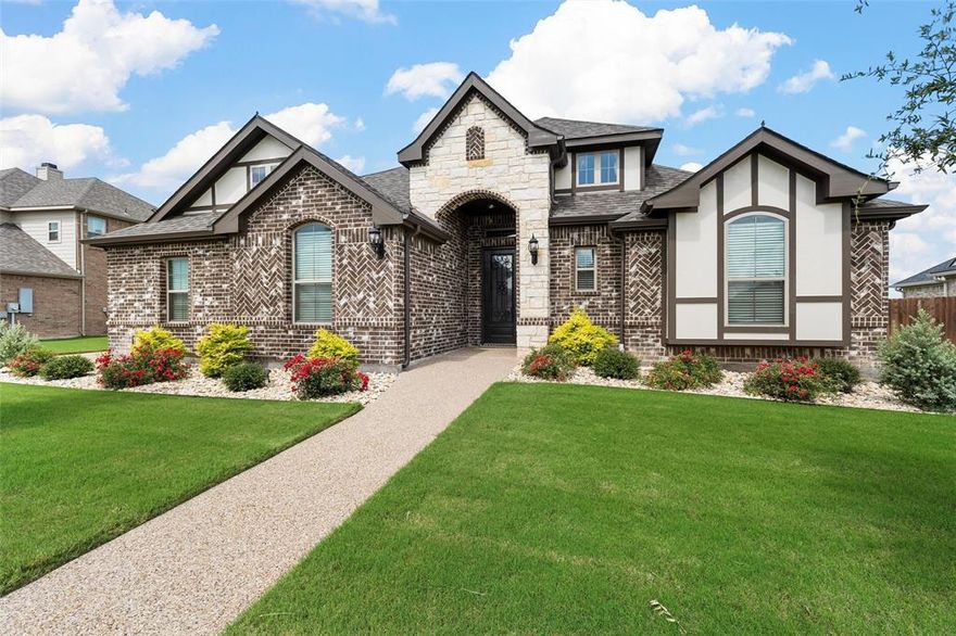 Welcome home to a place that instantly feels warm, welcoming, and just right. This beautiful 4-bedroom, 2-bath home in Midway ISD (Chapel Park Elementary) was built in 2022 and offers that perfect mix of modern comfort and everyday livability buyers are searching for. From the moment you step inside, you’re greeted by an open, airy layout designed for real life—quiet nights in, busy mornings, and those fun gatherings with the people you love most. The living room is centered around a stunning stone wood-burning fireplace, creating a cozy spot to unwind on cooler Texas evenings. The kitchen truly feels like the heart of the home. With its large island, high-end appliances, and plenty of space for everyone to gather, it’s the kind of kitchen where memories are made—holiday baking, homework sessions, and late-night conversations all fit easily here. At the end of the day, the primary suite becomes your personal retreat. You'll love the spa-like bathroom with a tiled shower, soaking tub, dual vanities, and a huge walk-in closet that makes staying organized feel effortless. The three additional bedrooms offer flexible space for guests, a home office, or a dedicated playroom—whatever fits your lifestyle. Thoughtful touches throughout the home make everyday living smoother, including a mudroom and a side-entry garage. Outside, the covered back porch and spacious yard give you room to relax, grill, or simply enjoy a quiet moment outdoors.
Filled with natural light and designed with warmth and intention, this home blends modern style with that hard-to-describe feeling of “home.” And with shopping, dining, and everything Waco has to offer just minutes away, it’s easy to imagine life here.
Move in, settle in, and start making memories—you’re going to love it.