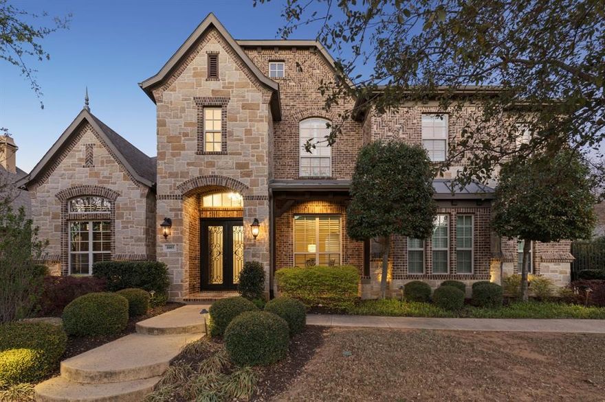 Meticulously maintained Southlake Shady Oaks home combines timeless charm, modern luxury focused on entertainment and privacy.  Double iron doors open to truly special grand domed foyer, elegant chandeliers, and curved staircase. Captivating spacious, light-filled w soaring ceilings and large windows flooding home w natural light. In heart of home is expansive open concept family rm and kitchen showcasing a ~1400 bottle climate-controlled wine cellar. Family rm w fireplace, 2 sets of 12-foot collapsible doors open to covered patio w fireplace and views of east-facing outdoor oasis surrounded by mature evergreens creating a tranquil private haven. Claffey built pool, spa and covered outdoor kitchen w built-in grill, XL Big Green Egg, side burners, sink, frig, 2 drop-in coolers, seating and lg storage closet. Lounge on covered patio, host summer barbecue, or simply enjoy serenity of your surroundings. Inside, gourmet kitchen is a chef’s dream, outfitted w top-of-line appliances: built-in Sub-Zero frig, 6-burner Wolf gas range, Wolf double ovens, two Bosch dishwashers, a warming drawer, dual sinks, and more. Wet butler pantry is perfect tea coffee nook. Luxurious serene primary suite retreat w sitting area, dual vanities, separate tub, dual entry dual showerheads and dual body sprayers, including his-and-hers closet w tornado storm shelter doubling as a secure safe. On 1st floor is a large secondary ensuite bedrm, private study and media rm can open or close to adjacent game rm space, w wet bar and pool bath right inside patio door. Upstairs, 3 generously sized ensuite bedrms, another game rm w wet bar and access to a covered balcony overlooking lush yard. Every detail has been thoughtfully crafted to deliver both style and functionality including specifically designed home audio-video features to satisfy tech savvy. Walk to top-rated Carroll schools, Bicentennial Park, and The Marq. Short drive to Southlake Town Square, amazing restaurants, shopping and DFW Airport.