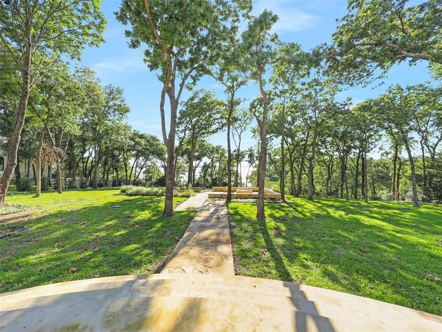 STUNNING WATERFRONT VIEWS! This luxurious estate in the prestigious Point Noble community has been extensively renovated and offers breathtaking lake views from every room. It includes a state-of-the-art recording studio, making it an excellent fit for musicians, influencers, and creatives. With 4 bedrooms, 5 bathrooms, and spacious living areas, including a chef's kitchen, its perfect for entertaining. The vaulted, beamed ceilings in the living area open up to stunning, private, lakefront cove views. Additionally, its proximity to parks, a boat ramp, shopping and schools adds to its convenience. A full list of updates is available in the listing documents, making this property an ideal choice for those seeking luxury, natural beauty, and entertainment opportunities.