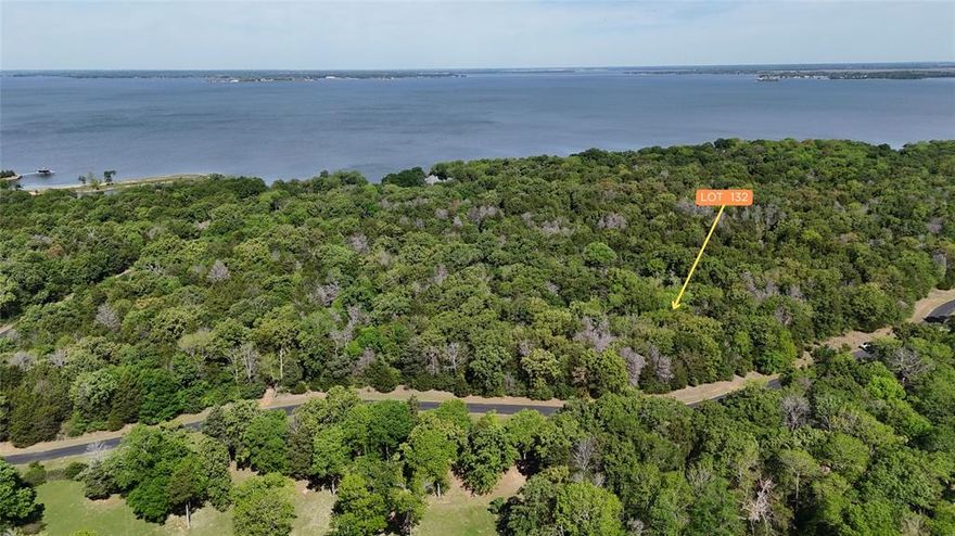 If you’ve been craving space, privacy, and a true connection to nature, this 1.34-acre off-water lot in a gated lakeshore community on Richland Chambers Lake delivers. Tucked deep within a heavily wooded setting, this property offers the freedom to carve out your own homesite while keeping the natural surroundings that make it feel like your own private retreat.

The lot remains untouched and full of mature trees, giving you the rare opportunity to decide exactly how much to clear—and how much serenity to keep. Imagine mornings with sunlight filtering through the trees and evenings spent watching deer wander quietly through the neighborhood. Wildlife is part of everyday life here, creating a peaceful, almost storybook setting.

Located behind a beautiful gated entrance with paved roads throughout, this community strikes the perfect balance between convenience and seclusion. You’re close enough to the lake to enjoy everything Richland Chambers has to offer, yet tucked away in a setting that feels worlds apart.

Restricted to site-built homes, the neighborhood maintains a cohesive, well-kept feel that protects your investment while still allowing you to build a home that fits your vision.

And if you’re looking for even more room to spread out, the neighboring lot is also available—giving you the option to create a larger, more private homesite.

This is where quiet, wooded living meets lake life—come walk it and see just how peaceful it feels.