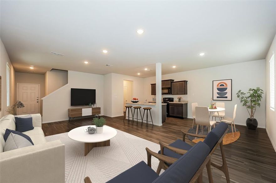 The Camden is a spacious two-story home featuring 3 bedrooms and 2.5 bathrooms. All bedrooms are located upstairs, along with a versatile flex space and a centrally placed laundry area for convenience. The open-concept first floor includes a large living room, kitchen with an island, and a dedicated dining area that opens to the backyard. The primary suite offers a private bathroom and two walk-in closets, while the additional bedrooms each feature walk-in closets of their own. Features include wood-grain vinyl plank flooring, a two-car attached garage, fenced backyard, and sprinkler system. All homes are SimplyMaintained for a $100 monthly fee that includes front and back yard lawn care and exterior pest control.