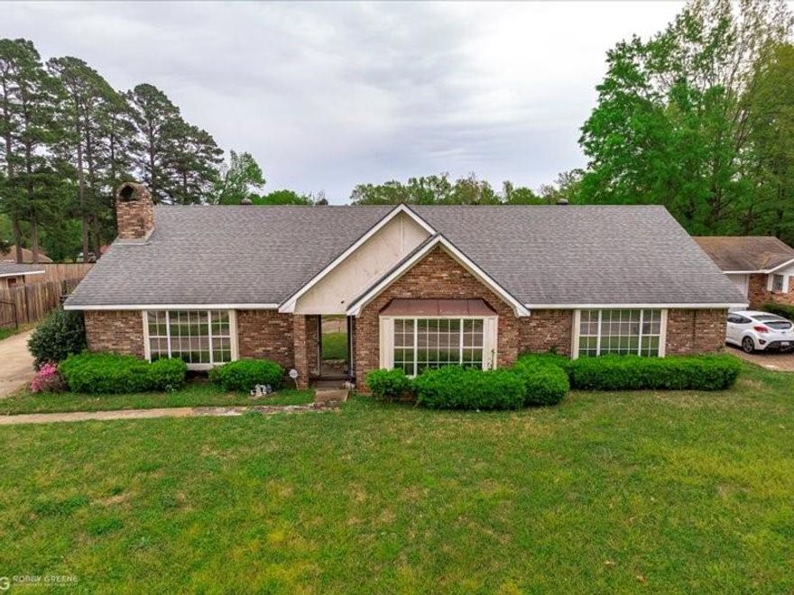 Back by popular demand!  This is confirmation that this home is for YOU!!  HOME IMPROVEMENTS MADE!!  New flooring, new paint, and all repairs made!! Discover the perfect blend of comfort and tranquility in this move-in ready, beautiful 3 bedroom, 2 bathroom home, offering an abundance of well-designed living space!  Nestled in the quiet Willow Ridge subdivision, this home boasts breath-taking lake views and an expansive backyard, perfect for entertaining or simply unwinding in nature.  For car enthusiasts or those in need of extra storage, this property is a rare find with THREE separate two-car garages, providing ample space for vehicles, a workshop, or additional storage.  Inside, you'll find a thoughtfully designed layout featuring a spacious master bedroom-primary suite, bright and airy living areas, and a well-appointed kitchen with plenty of counter space.  Enjoy peaceful mornings and relaxing evenings overlooking the serene lake, or take advantage of outdoor recreational opportunities.  This exceptional home offers both convenience and charm--schedule your private tour today!