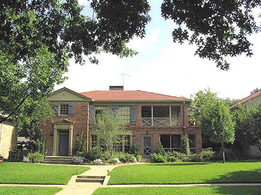 This Charming Property in Highland Park features Large rooms, nice moldings, Hardwood Floors, and floor to ceiling windows. The Updated Kitchens feature stainless appliances with a Viking range downstairs, granite counter tops, and open to the den areas. Other features include wood burning fireplaces with gas starters, and built in bookcases.  The upstairs unit is equiped with a Full-sized, stacked washer and dryer in the utility area by the kitchen which conveys with the property. Additionally, there is a Wonderful large covered porch! There is an elevator from the back porch to the upstairs.  There are two double garages with a Covered Walkway to the back entrances to the upstairs and the downstairs.  Also included with this wonderful property is a guesthouse with two rooms and a bath located above the Garages.  The choice is yours . . . this fantastic property may be used as a Duplex, or can easily be converted to a Single Family home; as several have done in this area.  Latest UPDATES: 1) Windows replaced throughout, including Garage apartment, 2022-2024 Totaling $60,000+   2) Downstairs Hall Bath was taken back to the studs in 2024.