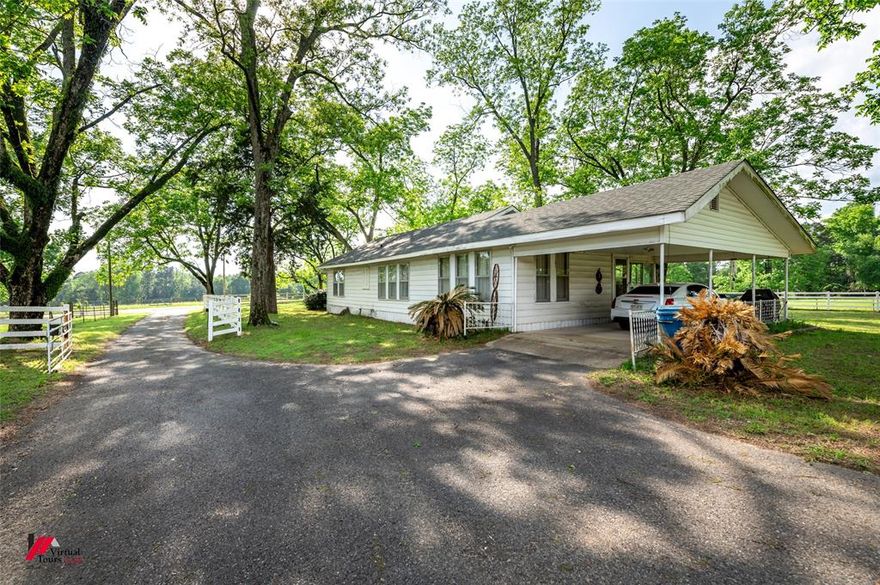 WOW! This farm house with 23 ACRES is waiting for you to move in! It is fenced for cattle has multiple outbuildings and barns and gorgeous rolling hills and trees line the property! If you are looking for some where to enjoy peace and quiet this is the place! The farmhouse is cute and has great features including a whole home generator!