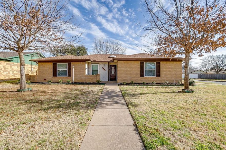 Welcome to this delightful 3-bedroom, 2-bathroom home on a corner lot with a side entry garage, located within the highly sought-after Burleson Independent School District. Roof and gutters were replaced in 2025. This charming residence offers a perfect blend of comfort and functionality, making it ideal for families or anyone looking to enjoy a peaceful lifestyle. As you step inside, you'll be greeted by a spacious living room featuring a cozy wood-burning fireplace, perfect for relaxing evenings with family and friends. The open-concept design seamlessly connects the living room to the kitchen, creating a warm and inviting atmosphere for gatherings and daily living. The kitchen has lots of cabinet space and eat-in area and has a sliding window to a bar area on the patio for outdoor entertaining. The primary bedroom is a true retreat, complete with an ensuite bathroom featuring a walk-in shower. The two remaining bedrooms are generously sized and share a full-size bathroom, providing comfort and privacy for all family members. Step outside to discover a covered patio, perfect for enjoying morning coffee or evening barbecues. The large backyard is an ideal space for children to play or for gardening enthusiasts to cultivate their green thumb. Additionally, a storage building offers extra space for tools and equipment, keeping your home organized and clutter-free. This home offers the ideal combination of practicality and charm, situated in a convenient location with access to quality schools and community amenities. Garage is a 2 car garage that has a room added but it can be removed and put back to a full 2 car garage. Don't miss the opportunity to make this your new home!