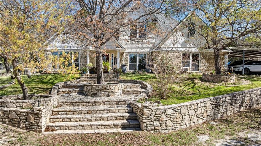 Welcome to this spacious ranch style home featuring a terraced limestone entry that creates a warm, inviting arrival. The home has five bedrooms, two full bathrooms, and two half bathrooms. With over 2800 square feet spread across two stories, this property offers plenty of room for comfortable living. Situated on a 1.67-acre wooded lot, the home boasts a fully fenced perimeter, including a separate dog run for your pets. Enjoy multiple living spaces with two family rooms and a cozy sitting room. The property also includes a workshop equipped with electricity, heating and air conditioning via mini splits, and WiFi, perfect for hobbies or remote work. The workshop has a separate enclosed area that can be used as a man cave, living area, or separate office area. Workshop is 30 feet by 40 feet with interior office that is 19.5 feet by 11 feet.