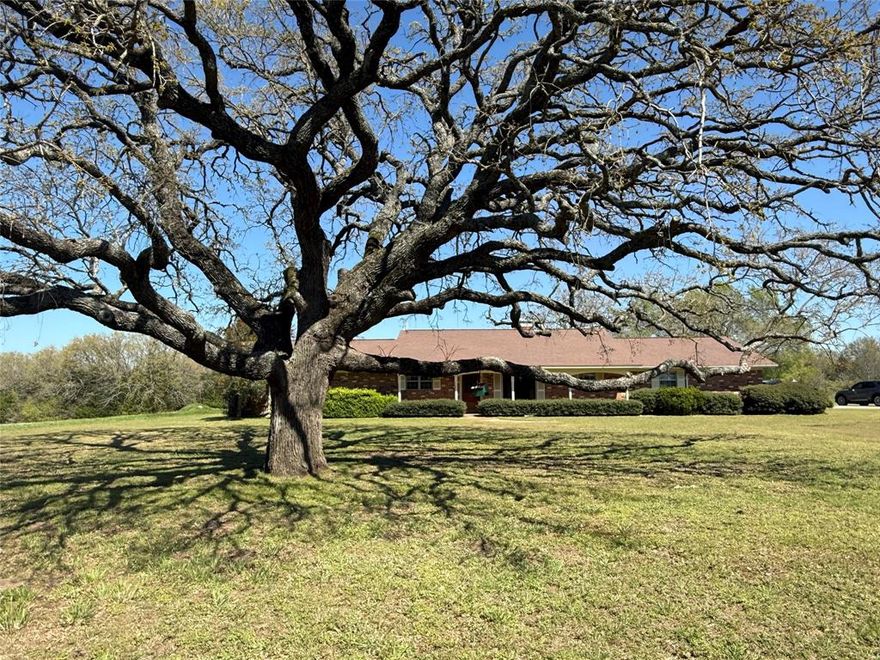 Experience the beauty of a peaceful rural setting overlooking majestic ponds framed by towering hardwood trees - nature at its finest. Behind the gate is a long entrance for privacy.  This spacious ranch-style home offers a relaxing rear patio perfect for enjoying the serene views. The property is well-equipped with a workshop, equipment shed, dog run and a barn ready for your animals.

With AG Exemption already in place and cross fencing throughout, this property is ideal for livestock, recreation, or a dream country lifestyle. The land is rolling and open meadows with hardwood patches. Lots of deer and wildlife. Bring your vision and make this exceptional property your own. Abundant hay production. Home could be given your vision or a great place to stay and build new. Stunning setting at the end of a county road.