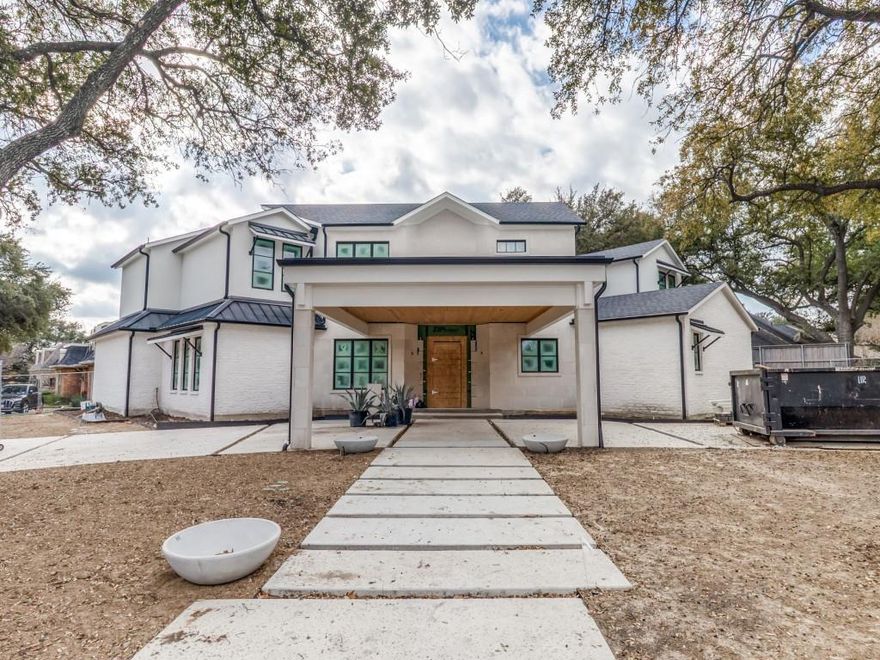 This architectural gem is more than just a home; it is a bespoke sanctuary situated in the highly coveted Windsor Park neighborhood—a quiet, tree-lined enclave in the true heart of Dallas. Designed by a top local visionary, this residence offers a masterclass in modern luxury, proving that sophisticated design can coexist perfectly with warmth, comfort, and effortless gatherings. Estimated to be completed in March 2026. From the moment you arrive, the abundance of parking space and the striking façade set a tone of exclusivity. The floor plan is a true rarity featuring the primary suite with a fireplace plus two full guest bedrooms on the first level that’s ideal for growing families and extended stay guests. The second floor features three additional bedrooms and a dedicated entertainment lounge complete with a wet bar and a sprawling balcony with another outdoor fireplace that’s perfect for sunset cocktails or crisp autumn evenings. For the ultimate convenience while entertaining, a dumbwaiter connects the levels, allowing for effortless transport of refreshments and cuisine between floors plus an elevator closet to ensure a forever home for any stage of life. To complete the pinnacle of luxury living, enjoy the private backyard oasis year round with a sparkling pool, outdoor living area with fireplace, and an outdoor kitchen. This home is tucked in a serene community while being mere minutes from the city’s premier destinations including world class shopping at the luxury fashion houses of Highland Park Village and the acclaimed NorthPark Center. This amazing location has premier medical access to The Carrell Clinic, Texas Health Presbyterian, and the Southwestern Medical District and close to SMU and top-tier private and public schools.  Call agent for showings.