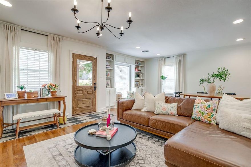 Beautifully and thoughtfully updated home in the much sought after Arlington Heights neighborhood. This home features a functional and open layout that is superior to many homes built in its age group. You can feel the quality of the upgrades as soon as you walk in the front door, beautiful wood floors run throughout the house, Kitchen is ergonomically designed and complimented with updated cabinetry, fantastic butcher block counter tops and stainless appliances with lots of natural light. Bathrooms have been meticulously updated with great design for storage and finish out, including new high quality cabinetry and characterful high quality tile. Seller has updated even the doors throughout the home for quality and period correctness. The Additional updates to front porch and driveway area include a inviting brick covering for the walk way to the house and the porch as well as a concrete walk to the side of the home. Texas native plants have been installed for ease of upkeep in the flower bed. Generous sized storage building includes electricity for weekend projects. This property is just minutes from some of the best shopping and dining in the metroplex.