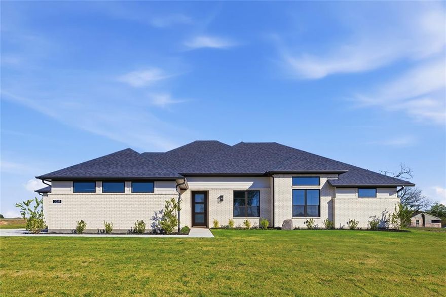 Set on just over an acre in Waterfall Ranch, 2321 Aleman offers the kind of space and privacy that’s becoming harder to find—paired with thoughtful design and everyday functionality. This single-story home features 4 bedrooms, 3.5 baths, a dedicated study, game room, and a spacious three-car garage, all laid out with an easy, open flow. The main living area is anchored by soaring vaulted ceilings and a floor-to-ceiling fireplace, with wide-plank wood floors carrying throughout. Expansive sliding doors frame the backyard and open to a covered patio, creating a seamless connection between indoor living and the acreage beyond.

The kitchen sits at the center of the home, finished with rich cabinetry, quartz countertops, a large island with seating, built-in appliances, and generous prep space—designed for both daily living and hosting. Nearby, the dining area offers a natural gathering space with views of the backyard. A front-facing study with glass doors provides a quiet workspace, while a separate game room adds flexibility for media, play, or fitness. The private owner’s suite is tucked away with a spacious layout and a well-appointed bath featuring dual vanities, a soaking tub, walk-in shower, and ample storage. Three additional bedrooms are well-sized and supported by two full baths, along with a powder bath for guests.

With over an acre to work with, there’s room to expand your lifestyle—whether that’s a future pool, outdoor living space, or simply more distance from everything around you. A rare combination of space, design, and livability—just outside the city, without feeling disconnected.