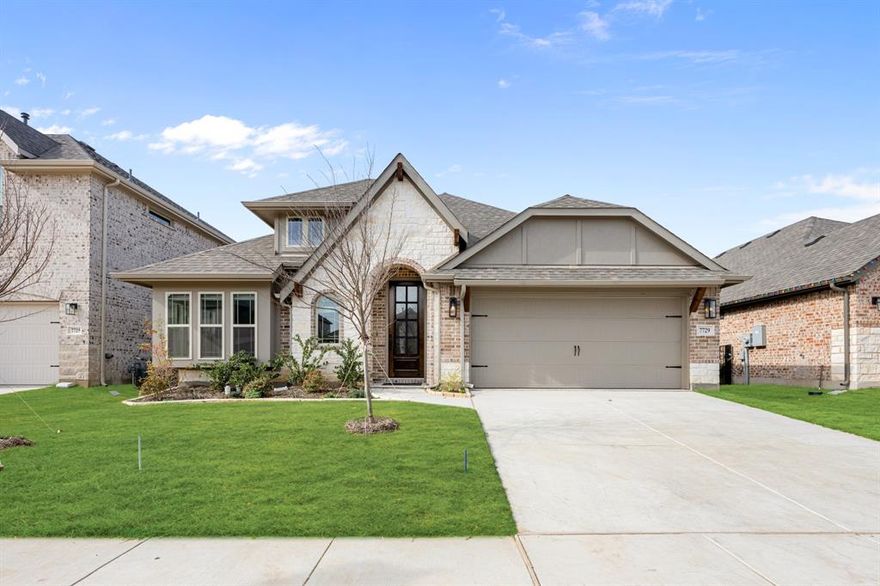 *4% Seller Contribution! Apply it toward closing costs or a rate buydown. Restrictions apply. See Community Manager for details.* NEW! NEVER LIVED IN. Ready NOW! This Bloomfield Homes popular Cypress II two-story plan offers open-concept living spaces, versatile rooms, and an abundance of natural light. Designed for both everyday comfort and elevated style, this home features an 8' Front Door and a brick and stone exterior with architectural appeal. The wood-look tile floors that complement the attractive cabinetry throughout, with sleek Granite counters in the kitchen and all baths adding a touch of elegance. The Kitchen comes ready for entertaining with a center island, upgraded backsplash, a built-in trash can pullout, all-gas appliances, and a walk-in pantry, while the dining nook includes a built-in buffet for added serving space. A striking Stone-to-Ceiling Fireplace with a cedar mantel anchors the Family Room, creating a cozy yet refined atmosphere. The flexible Study sits just off the entry and the oversized Primary Suite offers a spacious sitting area and window seat, walk-in closet, ensuite bath with garden tub and separate shower. Upstairs, a central Game Room, fourth bedroom, and third bath create a private retreat ideal for guests or multi-generational living. Thoughtful under-stair storage, and a dedicated laundry with linen closet—help keep things effortlessly organized. Enjoy the covered patio, fully fenced and irrigated yard. Located in an amenity-filled community with trails, a park, and a pool, this home truly checks all the boxes. Call or visit our Silo Mills model—open daily—to see it all in person!