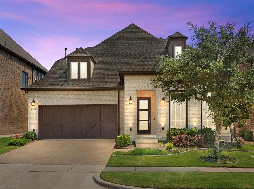 Located in the top-rated Frisco ISD, a few minutes away to Highway 121! Nestled on a tranquil greenbelt lot, this exquisite home showcases minimal wear and captivating views. The interior features a serene color scheme that enhances the beautiful wood and tile flooring. The open layout is perfect for entertaining, with a gourmet kitchen that boasts a spacious island, Silestone quartz countertops, designer cabinetry, and stainless-steel appliances, including a gas range. Enjoy the cozy ambiance of the gas log fireplace in the family room or step through the large sliding glass door to the inviting backyard. The elegant dining room and wine grotto add a touch of luxury. The primary suite is a true retreat, offering a lavish bath with a vessel tub, tiled shower, dual vanities, an ample closet, and stylish nickel fixtures. Upstairs, you'll find an additional bedroom, bathroom, game room, and media room, ensuring comfort and entertainment for everyone. This home is absolutely stunning!