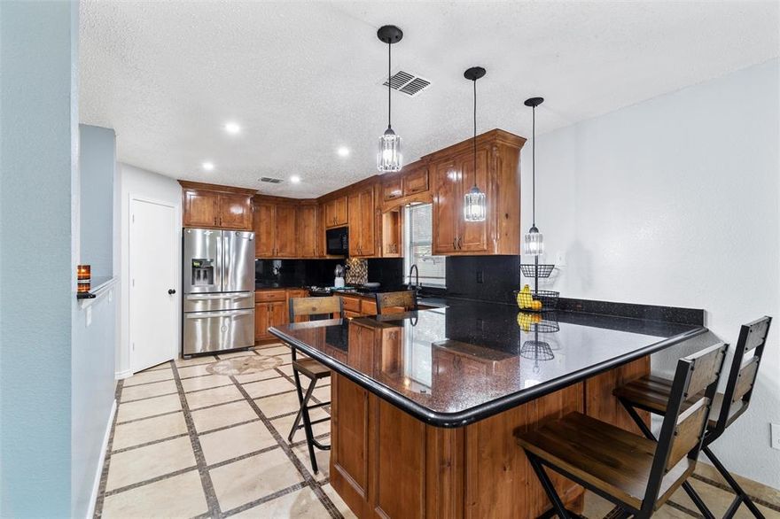 This spacious and inviting property boasts five bedrooms and three full bathrooms, providing ample space for both family living and entertaining guests. The added bonus of a suite offers flexibility and convenience for multi-generational living or hosting visitors. Step outside onto the covered patio, perfect for enjoying al fresco dining or relaxing in the shade. With its generous layout and versatile amenities, this home promises comfort, style, and endless possibilities for its lucky new owners.