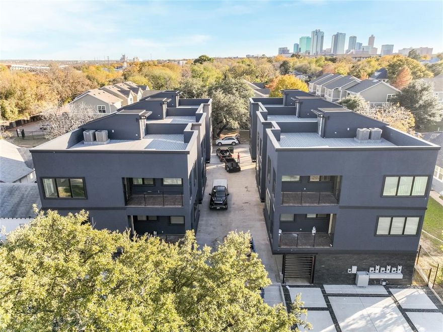 Brand new 3 story townhome offering modern design, exceptional outdoor living, and skyline views of Downtown Fort Worth. This residence features a private rooftop deck plus two additional patios, ideal for entertaining and enjoying city and park views. A small private yard and 2 car garage provide added convenience and functionality.

The interior showcases abundant natural light, open concept living spaces, and upscale finishes throughout. The kitchen is equipped with quartz countertops, custom cabinetry, stainless steel appliances, and contemporary fixtures. Spacious bedrooms, modern bathrooms, and thoughtful layout design create a comfortable and stylish living environment.

Located with a park directly behind the property and offering quick access to Downtown Fort Worth and the Fort Worth Stockyards, along with dining, entertainment, and major roadways. New construction with quality craftsmanship and low-maintenance living.
