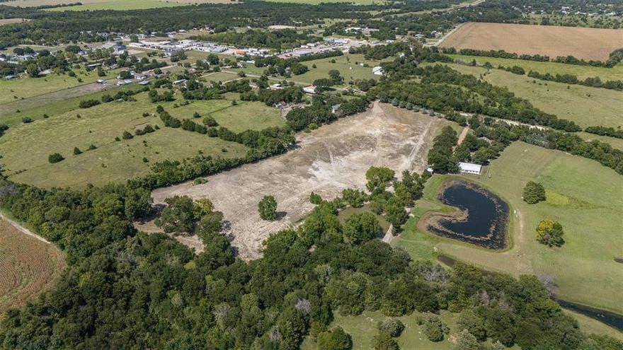 Welcome to 1065 Bluff Springs Road, a versatile property located just outside the city limits of Ferris, TX. This tract offers a rare opportunity for those seeking space, privacy, and flexibility of use—perfect for a weekend retreat, small farm, mobile home, or future development. Situated on a quiet country road with easy access to I-45 and FM?983, this lot provides the ideal balance of rural charm and urban convenience. The open terrain and natural surroundings offer endless possibilities—bring your animals, build a barn dominium, or simply invest in land with long-term value. Whether you're looking for a homesite, recreational space, or a blank canvas for your next project, this property delivers. Don't miss this opportunity to own land in a growing area of Ellis County with strong long-term potential.