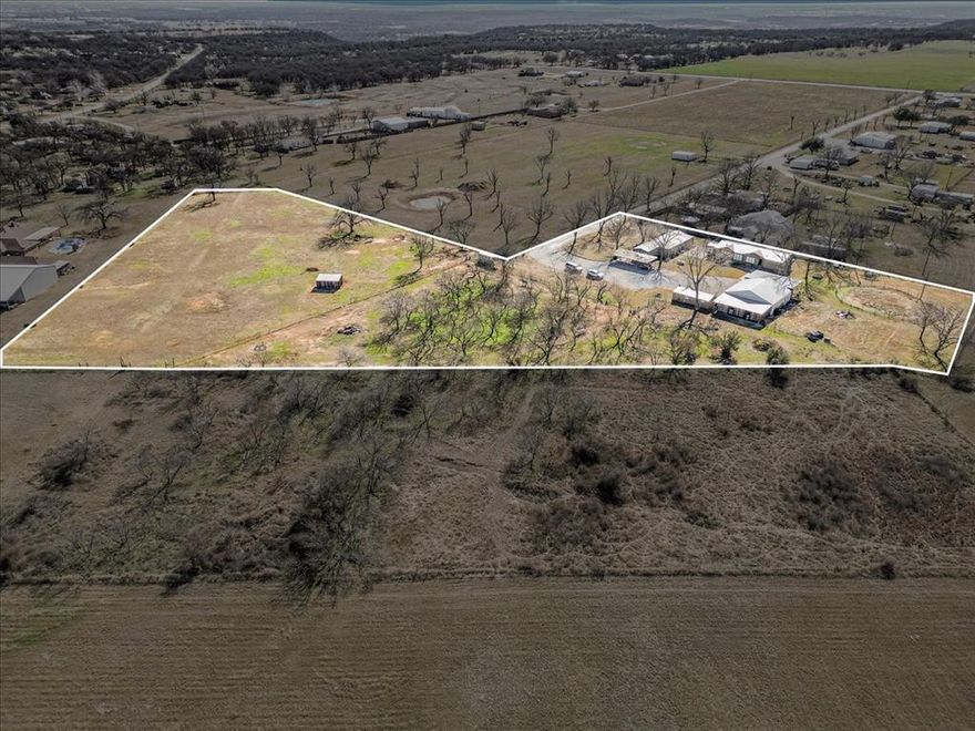 One of those unique, smaller horse properties with 3 residences (2 that are leased and income producing), a large shop with feed-tack room & 3 horse stalls. Located just minutes south of Mineral Wells and minutes West of Millsap. Be on I-20 headed east or west in about 10 minutes or headed north on 281 in moments. Fort Worth lies about an hours to the East. Property is tucked in at the end of Chapman Dr for privacy and low traffic activity. Plenty of covered parking with 2 large carports & space to park in the shop. Mature pecan trees sprawl across the property with a mix of native and non-native including soft and hard shell. Perfect area for a round pen on the West end of the property. Pasture is cross-fenced with braided wire fencing with cedar stays & has electric fencing as reinforcement. Furniture in the primary residence and equipment can be negotiated outside of the sale of the real estate.