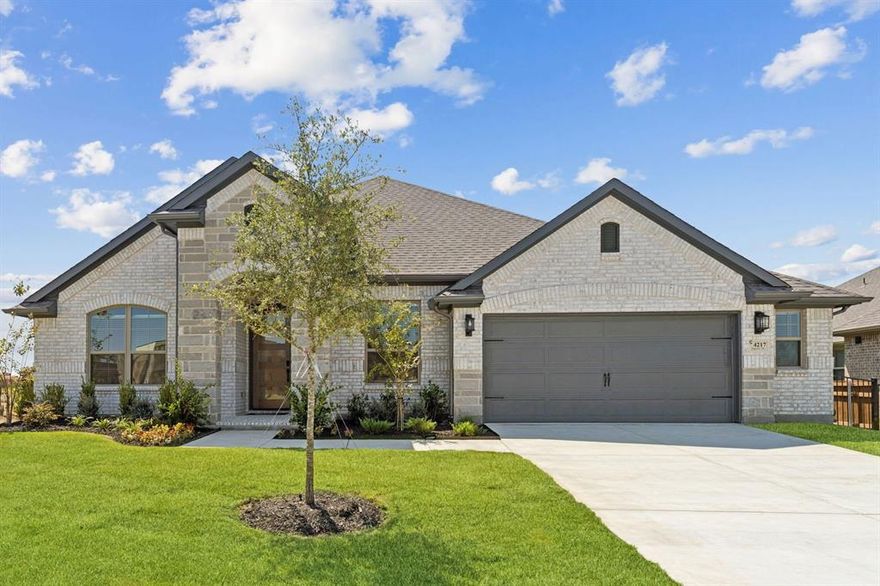 MLS# 21096210 - Built by Chesmar Homes - Ready Now! ~  Move-in Ready! Discover this stunning single-family residence in the desirable Silo Mills subdivision, offering 2,699 sq. ft. of luxurious living space. This traditional-style home features 4 spacious bedrooms, including 4 primary suites, and 3 full bathrooms, perfect for family comfort. The open floorplan seamlessly connects the living areas, highlighted by vaulted ceilings and an inviting fireplace in the family room. The eat-in kitchen boasts a large island, pantry, and modern amenities, including a smart home system. Enjoy the landscaped, private yard from the covered patio, and take advantage of the central heating and cooling systems for year-round comfort. With an oversized 2-car garage and exceptional schools in the Godley ISD, this home is an ideal choice for families. Don't miss this opportunity to own a beautifully crafted residence!