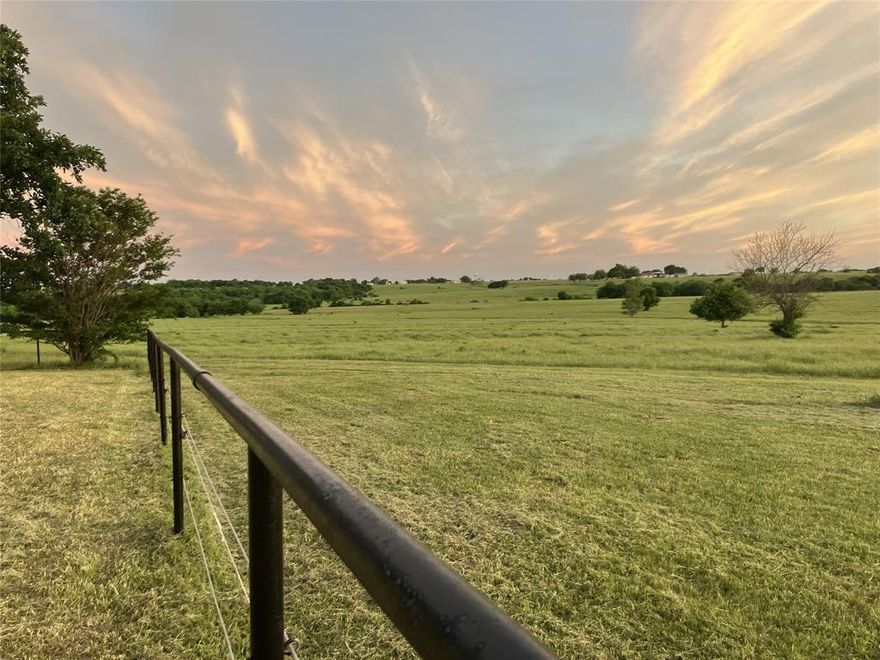 Located just 1.5 hours north of DFW in Cooke County, this unspoiled 230-acre ranch—formerly the Stormer Quarter Horse Farm— contains no windmills, or oil and gas wells, and offers a rare opportunity to own a large tract in the Muenster area, where properties are typically held within families for generations.  This beautiful property of rolling terrain truly fits the mixed-use bill with excellent infrastructure for livestock operations and wooded areas of mature hardwoods providing excellent cover for hunting and recreation. There are two seasonal creeks that run through the property and numerous potential home building sites. Improvements include a three bedroom, two bath functional and comfortable residence with 2,336 SF built in the 1950's that is being sold As-Is, a hay barn, and a second barn for storage of farm equipment. Infrastructure for cattle operations include well designed sorting and working pens, and a squeeze shoot. Horse enthusiasts will appreciate the 5 covered stalls with runs, 6 additional covered stalls, and five uncovered runs. There are three stock tanks on the property that hold water year-round and two water wells, an older well for livestock, and a 555' well drilled in 2023 that serves the home. Grasses include a blend of native pasture and improved grasses. The perimeter fencing has all been replaced in stages within the last 3-10 years. The property is in close proximity to the quaint German town of Muenster, with a hospital, excellent public and private schools, two large annual community festivals, shopping, and restaurants. The seller owns no mineral interest in the property.
