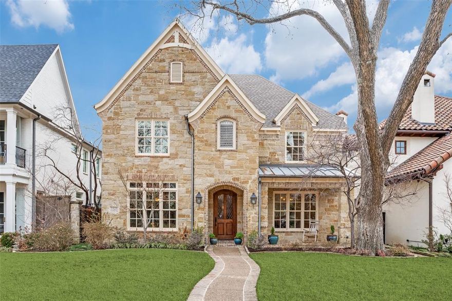 Location, location, location! Welcome to 3325 Amherst—an outstanding family home in the heart of University Park. This meticulously maintained 5-bedroom, 5-full-and-1-half-bath residence spans 4,339 sq. ft. with 4 living areas, designer finishes, and recent updates including fresh paint, new carpet, and updated lighting. The entry greets you with a dramatic 20-foot entry, split formal living-dining rooms, HRDW floors, and a beamed-ceiling office featuring built-in bookcases. The formal dining flows into a chef’s kitchen via a butler’s pantry with wine refrigerator and large walk-in pantry. Open family room boasts a gas log fireplace, custom cabinets, surround sound, crown molding, an open bar, and stunning views of the professionally landscaped backyard with covered patio and serene fountain. The kitchen shines with stainless steel appliances, a 6-burner Viking gas cooktop with pot filler, spice drawer, Viking double-door refrigerator, microwave, double ovens, Bosch dishwasher, granite counters, and custom alderwood cabinets plus adjacent breakfast nook and dedicated wine room. Upstairs, the oversized primary suite offers a sitting area, wall of windows overlooking the backyard, gas log fireplace, coffered ceiling, built-in speakers, and refreshed paint & carpet. Primary bath features marble counters, double sinks, walk-in shower, jetted tub, built-in vanity, enclosed WC, large walk-in closet with custom built-ins. Four additional bedrooms include one ensuite, two sharing a Jack-and-Jill bath, and a flexible fourth room (ideal as bedroom or bonus) with adjacent full bath. Step outside to a stunning entertainer’s retreat: covered patio, wood-burning fireplace, JennAir gas BBQ, serene fountain, in-ceiling speakers, and lush landscaping. Just steps from Snider Plaza dining & shopping, Holmes Aquatic Center, Curtis Park, and top-ranked University Park Elementary (consistently in Texas's top 1%). Enjoy true community spirit, this is University Park living at its finest!