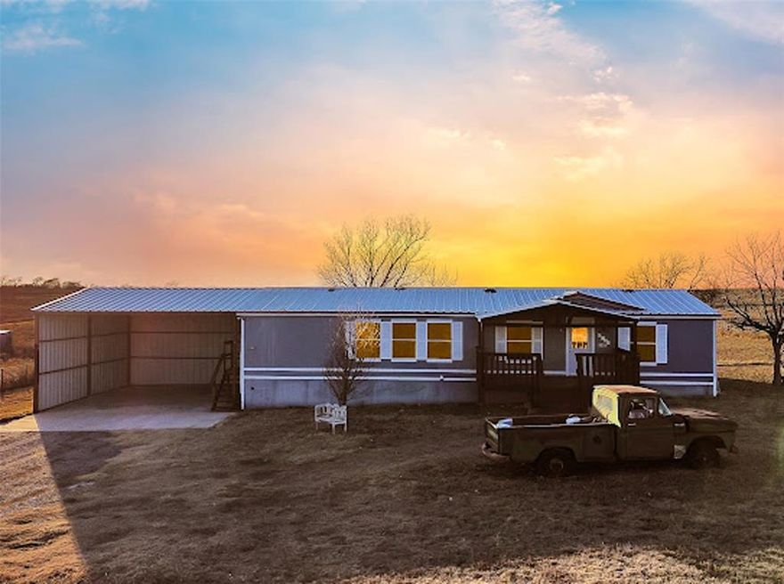 Welcome to 6104 Hawk Ct – Your Private Texas Retreat!

Discover the perfect blend of peaceful country living and modern convenience with this well-maintained and refreshed 3-bedroom, 2-bathroom double-wide mobile home nestled on an impressive **1.444 acres** of land. This is the rural escape you've been dreaming of!

Step inside to find a spacious 1,400 square feet of comfortable living space that's been lovingly cared for and is ready for its new owners. The open floor plan provides plenty of room for everyday living and entertaining, while natural light fills the home with warmth throughout the day.

**The land is the true star here.** With nearly one and a half acres at your disposal, the possibilities are endless. Bring your horses, start a garden, build a large workshop, or simply enjoy the wide-open skies and tranquil surroundings. And the best part? **No HOA restrictions** to limit your vision!

Enjoy the convenience of an attached 2-car carport to protect your vehicles from the Texas elements, and a charming covered front porch perfect for sipping your morning coffee while watching the sunrise.

Located in the sought-after Joshua area, you'll enjoy the serenity of country living while remaining just minutes from shopping, dining, and essential services.

Don't miss this incredible opportunity to own your slice of Texas paradise. Schedule your private showing today!