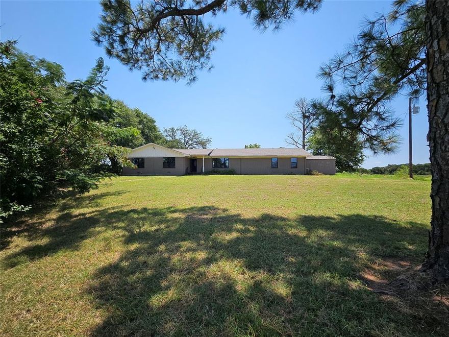 Back on market after contract expired.  Home is being listed with 5 acres.  Home can be sold with anywhere from 1 to 17.25 acres.  Home has recently been completely updated with new roof, energy efficient windows, flooring, counter tops, cabinets, paint and other upgrades.  Kitchen island with lots of storage.  Large bedrooms with an awesome open floor plan.  Must see to really appreciate.  Home is being sold under appraised value.  Some minor work still needs to be completed.  Price is as is, but seller can complete the work with an adjustment to sell price for the repairs. Seller will provide a one year service warranty at closing.