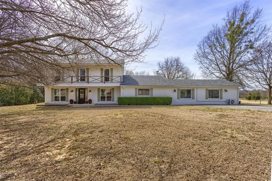 Tucked away on 3.5 gorgeous acres in Denison, this fully remodeled property offers the space, flexibility, and “wow” factor that’s getting harder and harder to find. With 6 bedrooms, 4 full baths, and 3,780 sqft, plus a massive 60x40 workshop with room for RV parking, this is the kind of home that truly fits real life (and all the toys that come with it).

Inside, everything feels fresh, bright, and clean thanks to a complete remodel. The heart of the home is the chef’s kitchen, featuring a commercial-grade 8-burner gas range, stainless steel appliances, a large island with seating, and a farm sink overlooking a picturesque, tree-lined view. A dedicated dining room sits just off the kitchen, perfect for hosting or family night dinner.

The spacious primary suite is filled with natural light and includes an ensuite bath with an extra-large shower, dual sinks, and a generous primary closet. The main living area is anchored by a striking stone accent wall and a cozy wood-burning fireplace, complemented by a cathedral ceiling and double doors that open to the deck and outdoor living space.

Downstairs also includes a secondary bedroom and full bathroom, plus an oversized bonus living room flooded with light from large picture windows on both sides. This space also includes a convenient kitchenette area and an extra-large mudroom with seating, making day-to-day life easier for busy households.

Upstairs, you’ll find four additional bedrooms, two full bathrooms, and the laundry room, giving everyone plenty of room to spread out.

Outside, the property offers plenty of room to roam and relax, with a partially fenced rear perimeter that adds separation and peace of mind. No HOA and zoned for Pottsboro ISD. If you’ve been looking for a one-of-a-kind property with acreage, updates, and an incredible workshop setup, this one delivers.