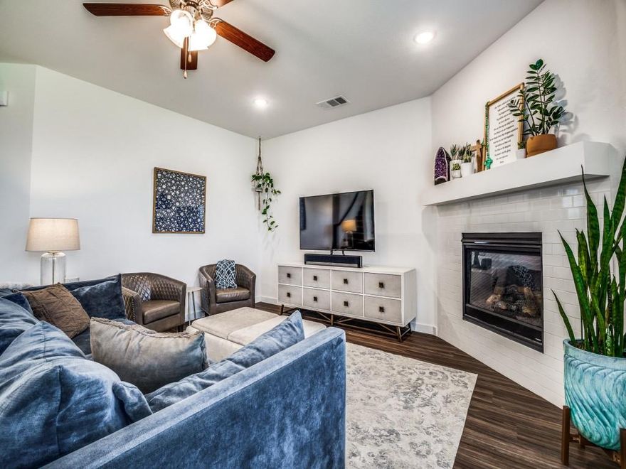Rare opportunity for a like-new, 2019-built home in the highly sought-after Seventeen Lakes community, now at an exceptional new price. This spacious two-story layout offers modern energy efficiency and premium finishes, including a bright chef’s kitchen featuring white quartz countertops, a five-burner gas range, and durable luxury vinyl plank flooring that flows seamlessly into the open gathering spaces. The private primary suite is conveniently tucked away on the main floor, while the second level serves as a perfect retreat with three generously sized bedrooms and a massive game room. Storage is a standout feature here, with an oversized laundry room—complete with space for an extra refrigerator or freezer—and a rare, walk-in decked attic. Step outside to a covered patio and a spacious backyard that offers total privacy with no neighbors directly behind. Nestled in a quiet location within the top-rated Northwest ISD (Byron Nelson HS), residents enjoy resort-style pools, scenic walking trails, and community lakes. This is an incredible chance to secure a move-in-ready home with a flexible floor plan and unmatched community amenities.