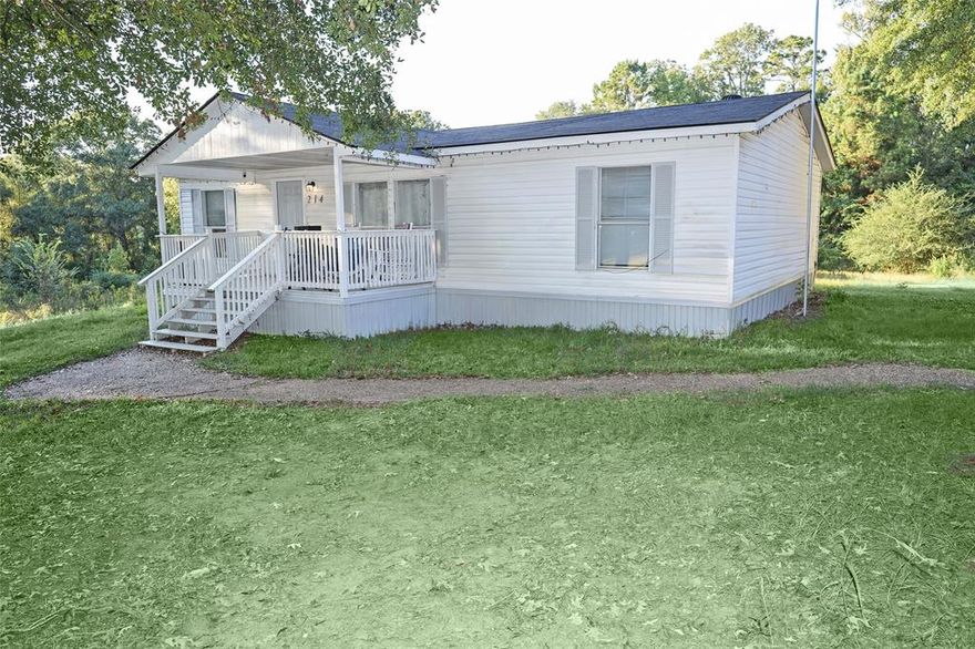 This beautifully updated 3-bedroom, 2-bathroom home sits on a spacious 1.27-acre lot surrounded by mature trees and open green space, offering both privacy and room to roam. Step inside to find a bright, open-concept layout where modern updates blend perfectly with cozy southern charm. The large living area features fresh paint, stylish flooring, and abundant natural light, creating an inviting space to gather and relax. The kitchen is a showstopper with crisp white cabinetry, modern hardware, sleek stainless-steel appliances, and a spacious center island with breakfast seating, perfect for entertaining or family meals. Just off the kitchen, a custom-built breakfast nook provides a warm and intimate spot to start your mornings. The primary suite is a peaceful retreat, complete with a large bedroom and an updated en-suite bath featuring a walk-in shower, built in cabinets and vanity for built-in storage. The secondary bedrooms are well-sized with great closet space, while the guest bath and laundry area have also been tastefully refreshed with contemporary finishes. Step outside to enjoy the tranquility of country life on your covered front porch, while the backyard is massive truly a must see, or explore the new 400 sq ft air-conditioned outbuilding. This flexible space is ideal as a workshop, studio, or guest area, with water already run to the building for future expansion possibilities or it can be used as a climate controlled storage shed. Outside of the outbuilding there is a woodpile area, and plenty of open yard space for gardening, recreation, or simply soaking in the peaceful rural views. Located just minutes from Highway 5 and a short drive to Stonewall and South Shreveport, this home offers the perfect combination of country serenity and convenient access to town. Move-in ready, modernized throughout, and full of charm, this property is the perfect place to call home. Call today for your private showing!