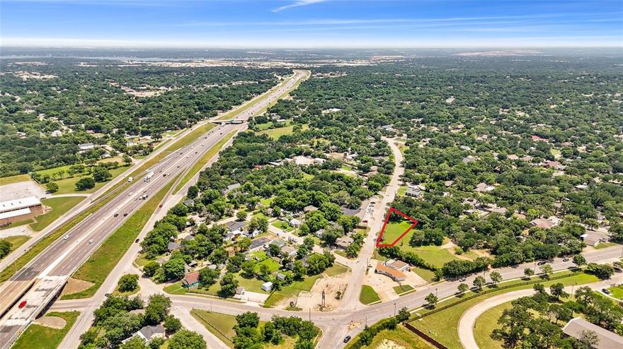 This commercial lot with E zoning sits in a high-visibility corridor along MLK Fwy-US-287 and is surrounded by established neighborhoods and local businesses. It offers an excellent opportunity for small business owners, investors, and owner-users to develop neighborhood retail, professional or medical offices, or service-based commercial use (subject to city approval). With convenient access to downtown Fort Worth and major transportation routes, this location provides strong visibility for a future storefront or office and the chance to serve the rapidly growing Southeast Fort Worth community.