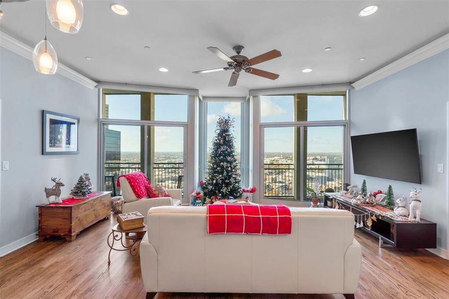 Urban Living in the Sky! Great 2 bedrooms 2 bath condo with floor to ceiling windows overlooking downtown Fort Worth and 7th Street District, the horizon and the Trinity River from the 27th floor of the Tower. Awesome condo with raised hardwood floors, custom contemporary cabinetry, glass tile backsplash, designer lighting, LED lights, solar UV Window Tinting, electric shades, stainless steel appliances, and totally remodeled white Marble primary bath with large Shower. 2 Deeded parking spaces in Tower garage. 24 hr 7 days week Concierge desk, secured fob access building, fitness center pool, party room, guest suites, fogpark and outdoor dining terrace with grills and firepit. Walk to Sundance Square and Plaza, Trinity biking and running trails, dining, shopping, entertainment venues. New transportation Tex Rail leaves closeby to DFW airport terminal!  WalkScore 92, Bike Score 82 and Transit Score 65!