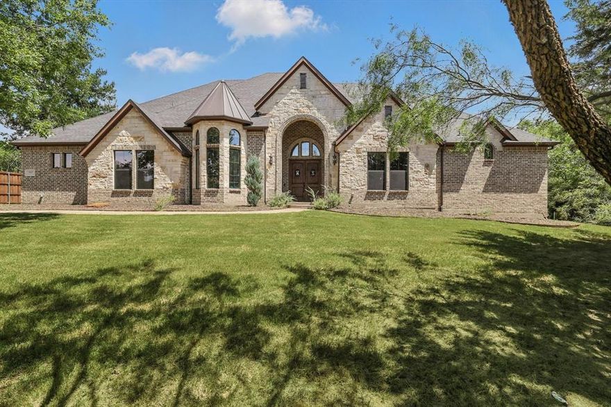 Set on a serene, tree-lined lot of over an acre, this beautiful home offers space, comfort, and functionality in every detail. The main level features 4 spacious bedrooms, including a luxurious primary suite, along with a dedicated study and an open-concept living area perfect for entertaining. The heart of the home is the stunning kitchen, complete with ample counter space, quality finishes, and a seamless connection to the living and dining areas. Upstairs, you'll find a private retreat with a separate bedroom and full bathroom—ideal for guests or multigenerational living—as well as a large media room for movie nights or game day gatherings. A rare find, the home also boasts a four-car garage and plenty of room to roam on its oversized, wooded lot. Don’t miss the opportunity to make this exceptional property your next home!