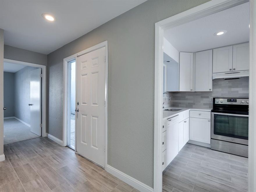 Discover a beautifully designed Townhome w 3 en-suite bedrooms. Recent Updates include, new floors downstairs, updated kitchen counters, cabinets, backsplash, kitchen sink and kitchen paint. The upstairs Primary bathroom updates include, new sink, new counters, cabinet and updated shower. This is an ideal primary residence or rental property, due to its proximity to University of Texas at Dallas. Each of the 3 en-suite bedrooms has their own private bathroom & very spacious walk-in closets! Perfect for professionals, college students, roommates & families. Enjoy the private & gated courtyard entry into the home, bright and inviting living room filled w natural light, wood burning fireplace, ideal for sophisticated entertaining & comfortable family living. The 1st floor offers 1 en-suite bedroom, spacious kitchen w plenty of counter & cabinet space, the oversized dining area opens to the expansive living area with views of the private back terrace. The 2nd floor offers 2 en-suite bedrooms, 1 en-suite includes a wood burning FP & private balcony. The full-size WD is on the 2nd floor, along with another private balcony & the 3rd en-suite bedroom! WOW! Easy access to 635, 75, Texas Instruments & 25 min from Downtown