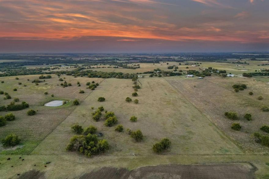 Honey Hill Ranch presents a rare opportunity to acquire approximately 71 acres of rolling North Texas countryside just north of the DFW growth corridor near Gainesville.

The property offers expansive elevated views, open pastureland, mature trees, and a scenic pond, creating an ideal setting for a private estate, equestrian retreat, or long-term land investment.

With gently rolling topography and multiple ideal building sites, the land provides exceptional flexibility for a future custom residence, weekend ranch, or thoughtfully planned parcel strategy.

The acreage is fully fenced and currently utilized as native pasture, offering both immediate agricultural use and long-term appreciation potential as North Texas continues its steady expansion northward.

A private pond enhances the property’s natural beauty and usability, while wide-open sightlines deliver a rare sense of scale, privacy, and tranquility.

This ranch is located outside city limits with no known zoning restrictions, allowing buyers to explore a range of residential, agricultural, or recreational uses.

The offering includes multiple contiguous parcels being sold together, providing scale that is increasingly difficult to find at this proximity to Gainesville and the DFW metroplex.

Whether envisioned as a legacy family ranch, horse property, private getaway, or strategic land investment, this property represents a compelling combination of lifestyle appeal and long-term upside.

Buyer to verify acreage, boundaries, and future use suitability. NO FLOODPLAIN